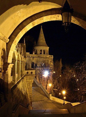 A stone city arch at night - inspiration for Stormseer by Stephanie A. Cain